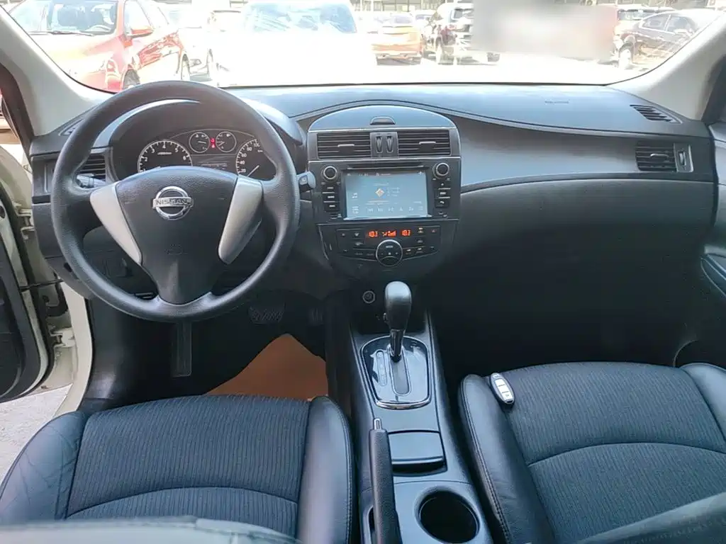 Nissan Tiida 2014 — фото 10