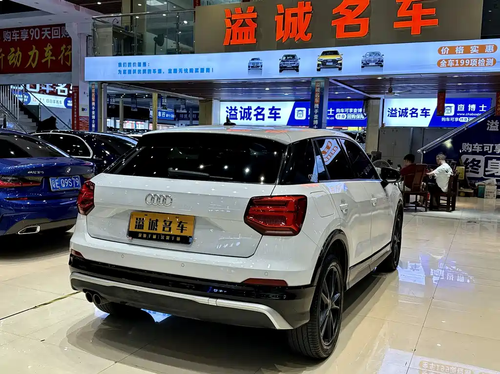 Audi Q2L 2021 — фото 11