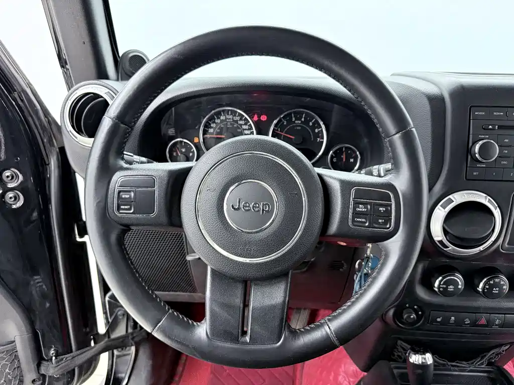 Jeep Wrangler 2014 — фото 6