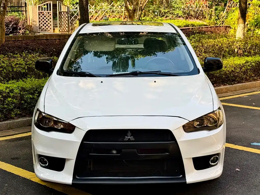 Mitsubishi Lancer EX 2013 — фото 2