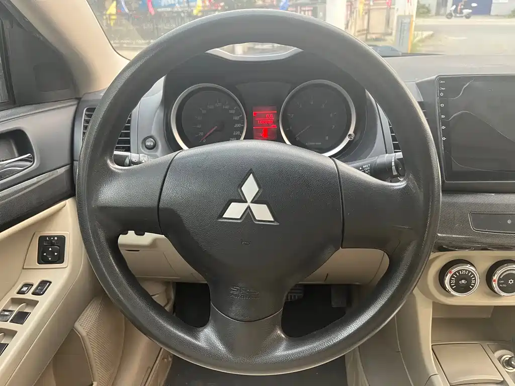 Mitsubishi Lancer EX 2012 — фото 23