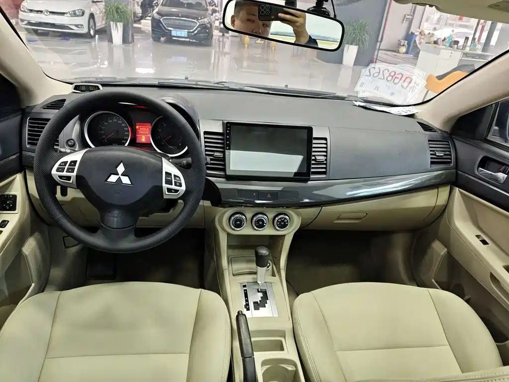 Mitsubishi Lancer EX 2013 — фото 16
