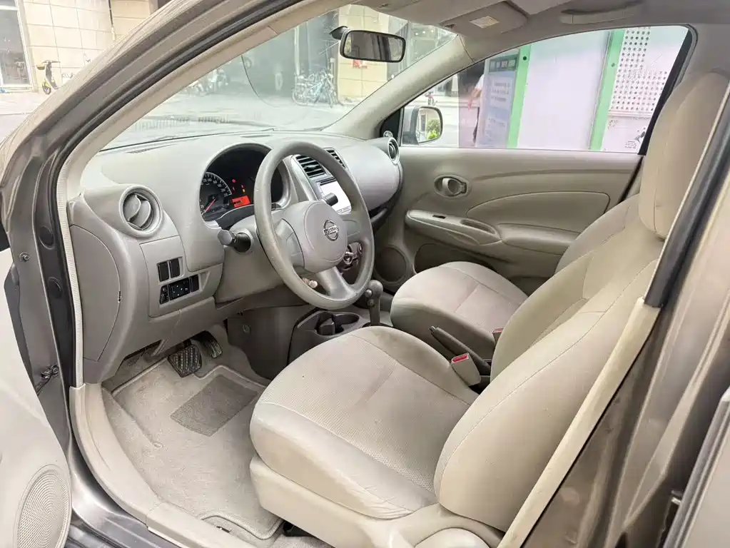 Nissan Sunny 2011 — фото 7