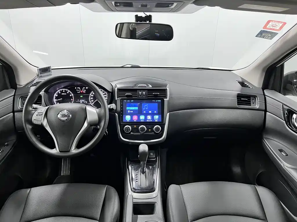 Nissan Tiida 2017 — фото 11