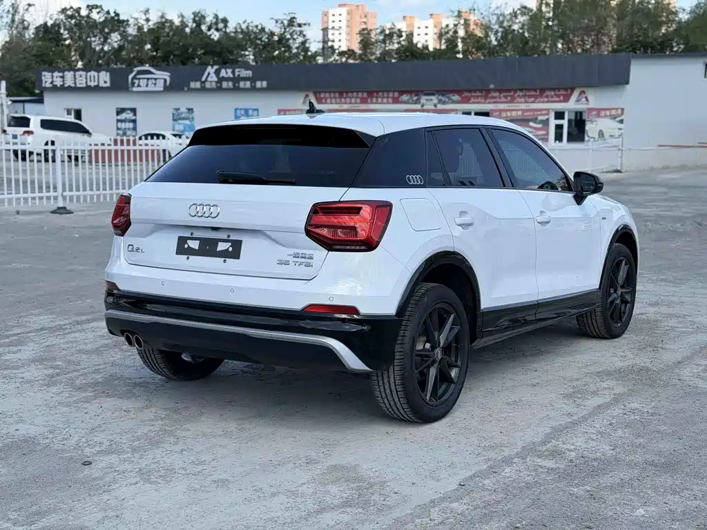 Audi Q2L 2021 — фото 10