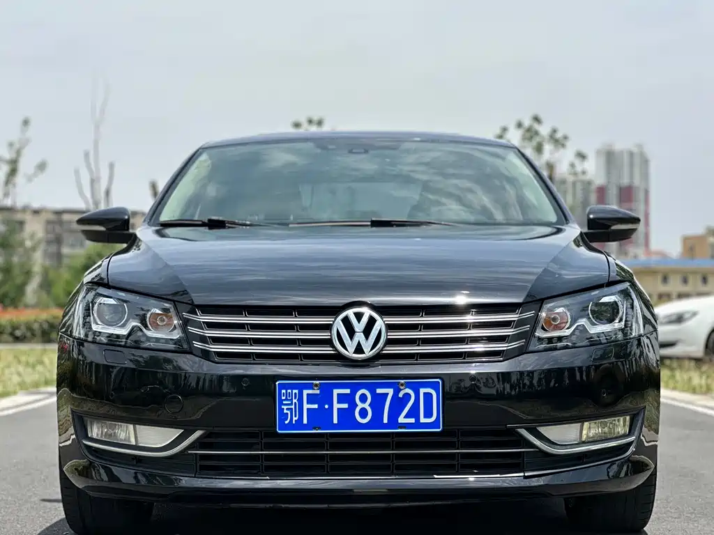 Volkswagen Passat 2013 — фото 2