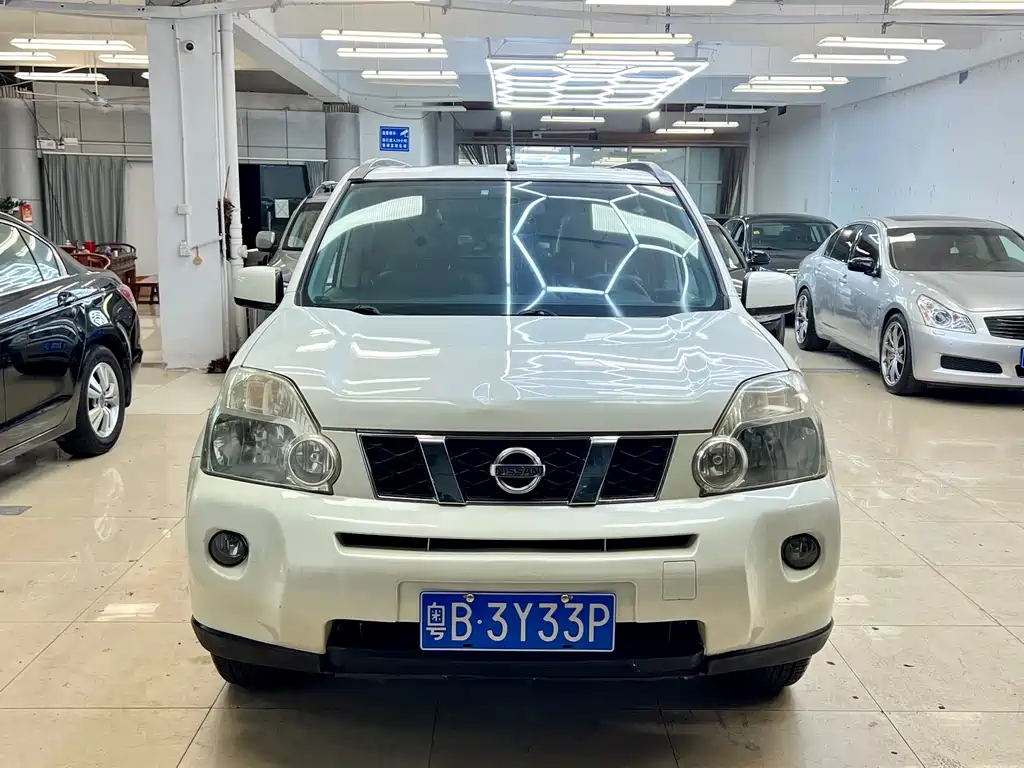 Nissan X-Trail 2010 — фото 2