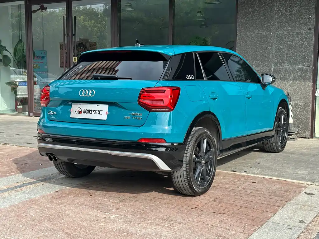Audi Q2L 2018 — фото 8