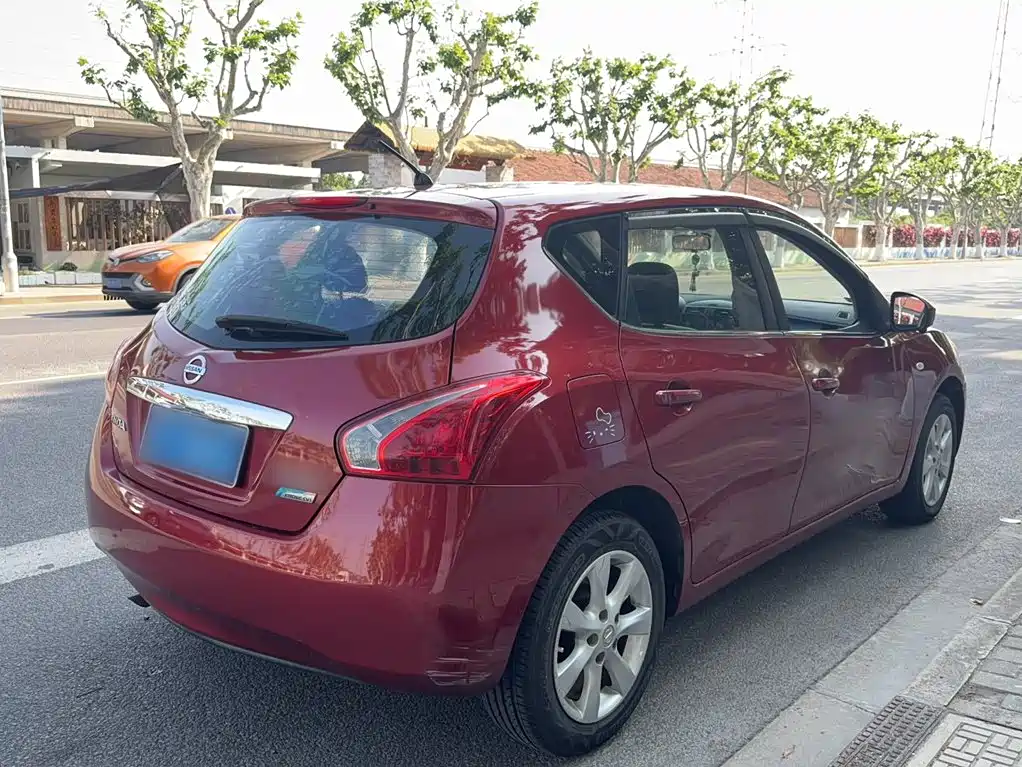 Nissan Tiida 2016 — фото 11