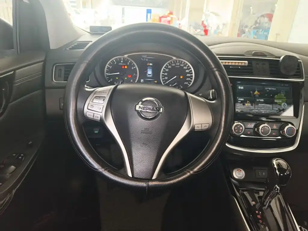 Nissan Tiida 2019 — фото 11