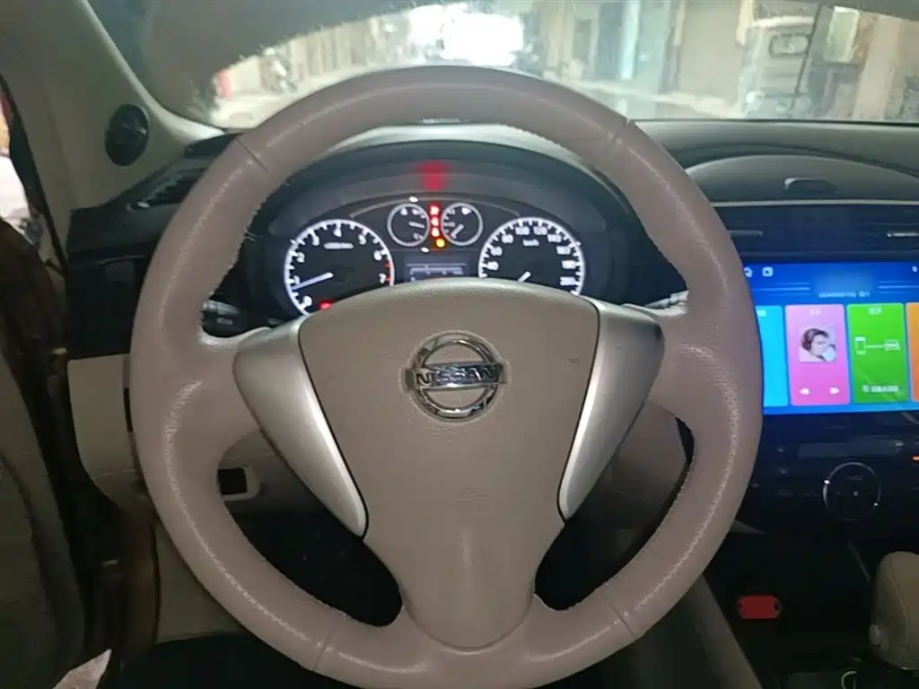 Nissan Tiida 2014 — фото 11