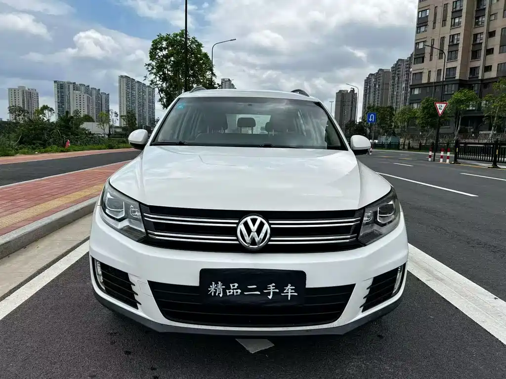Volkswagen Tiguan 2014 — фото 2