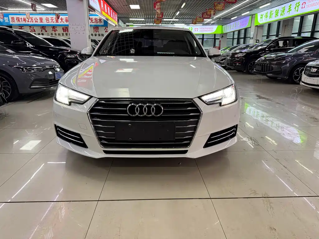 Audi A4L 2018 — фото 1