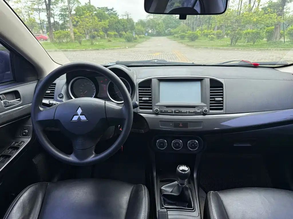Mitsubishi Lancer EX 2013 — фото 14