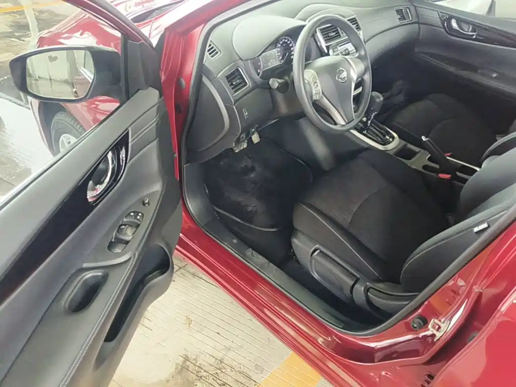 Nissan Tiida 2017 — фото 16
