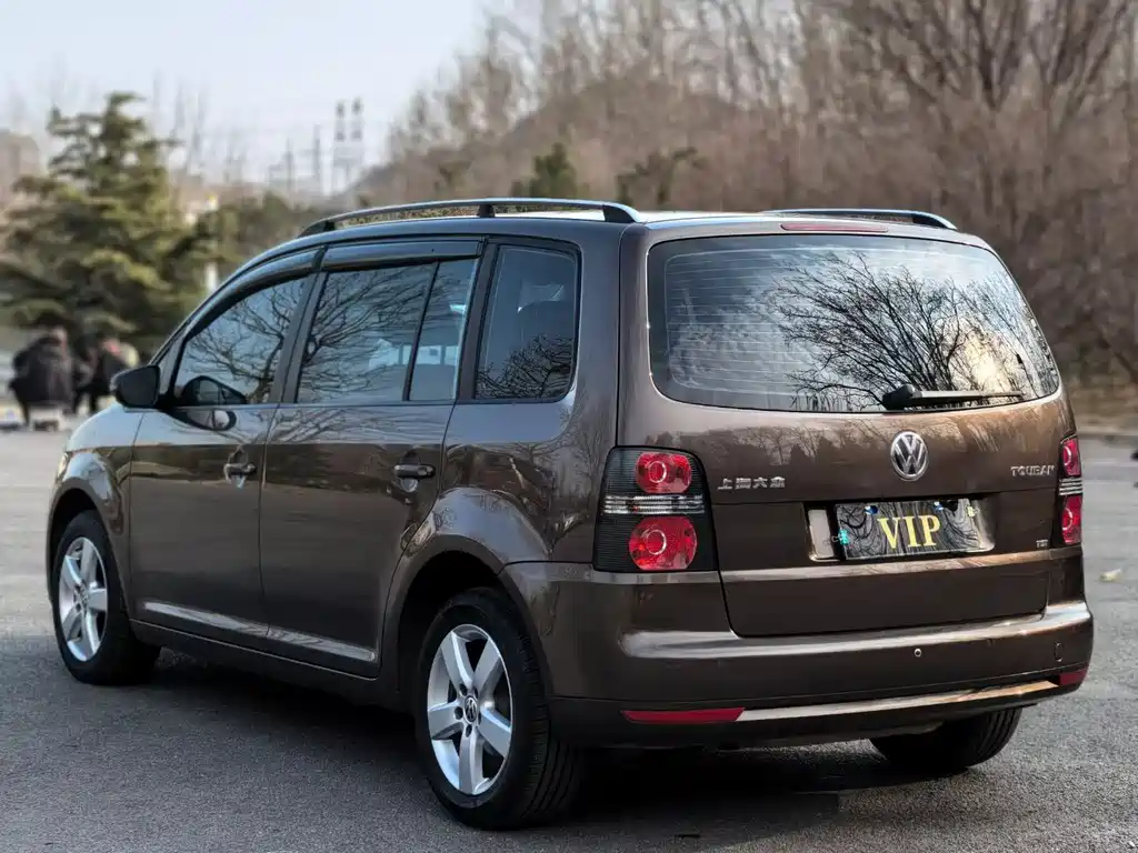 Volkswagen Touran 2014 — фото 4