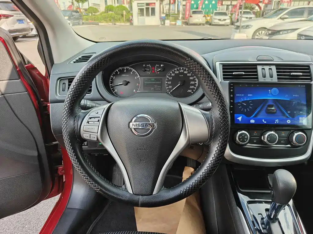 Nissan Tiida 2016 — фото 7