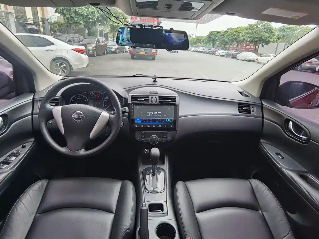 Nissan Tiida 2015 — фото 13