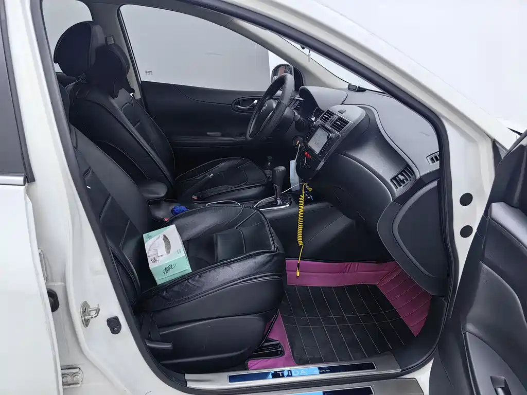 Nissan Tiida 2015 — фото 10