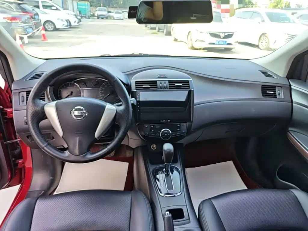 Nissan Tiida 2016 — фото 10