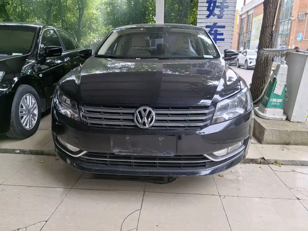Volkswagen Passat 2014 — фото 2