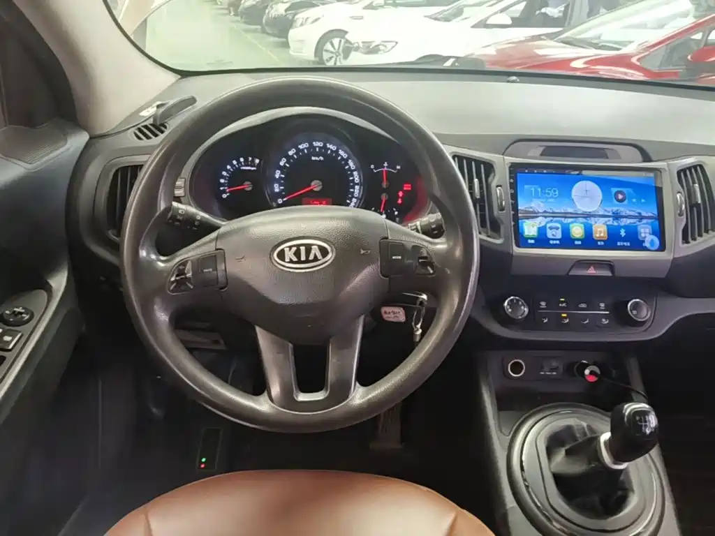 Kia Sportage 2014 — фото 11
