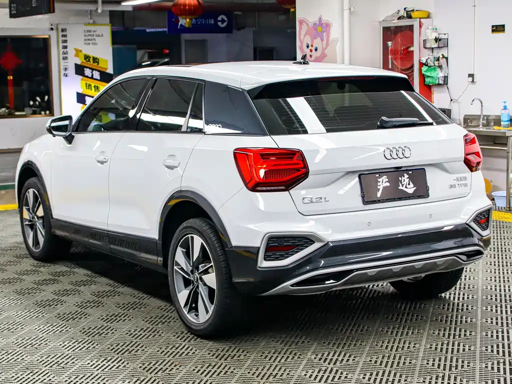 Audi Q2L 2022 — фото 22
