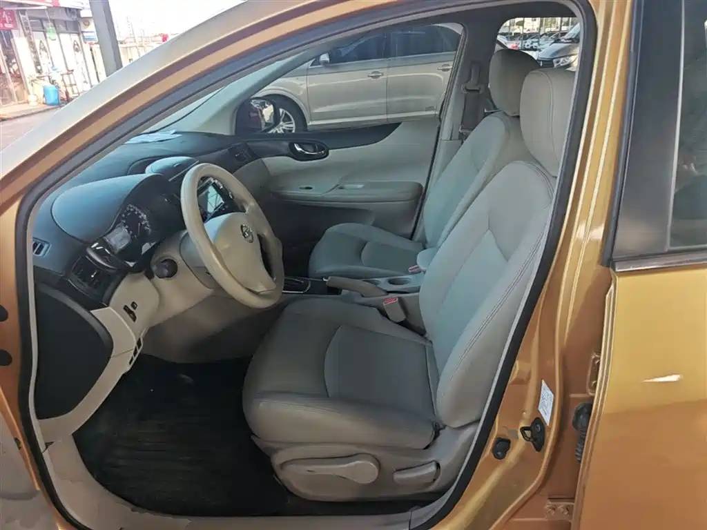 Nissan Tiida 2016 — фото 15