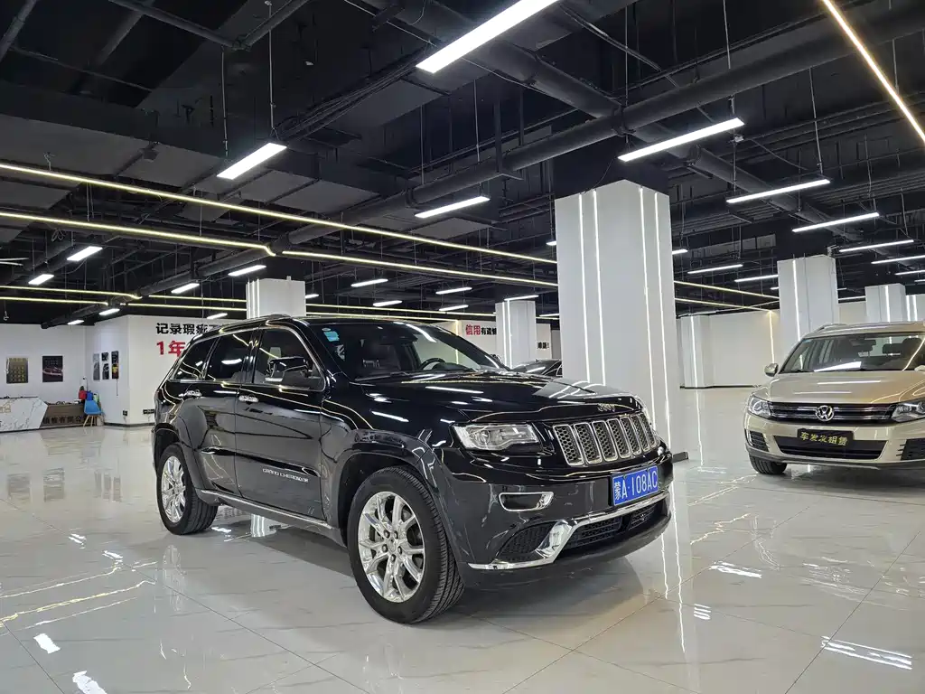 Jeep Grand Cherokee 2014 — фото 2