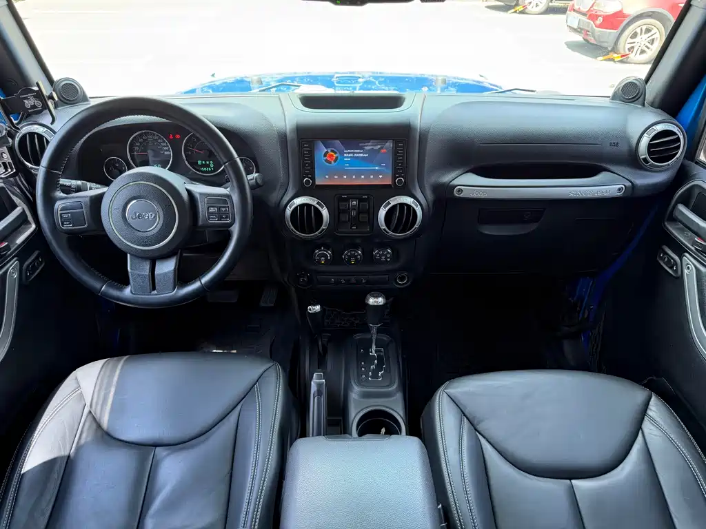 Jeep Wrangler 2014 — фото 7