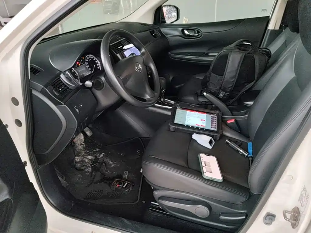Nissan Tiida 2015 — фото 16