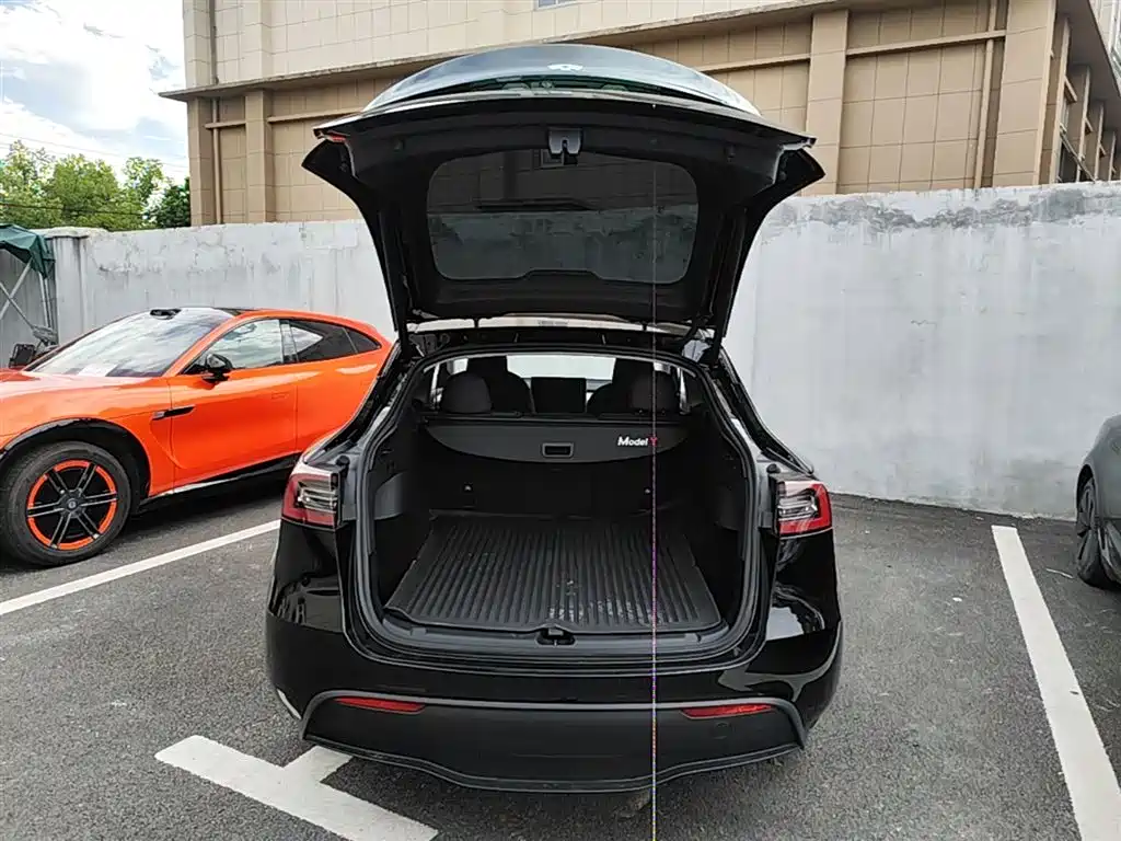 Tesla Model Y 2024 — фото 19
