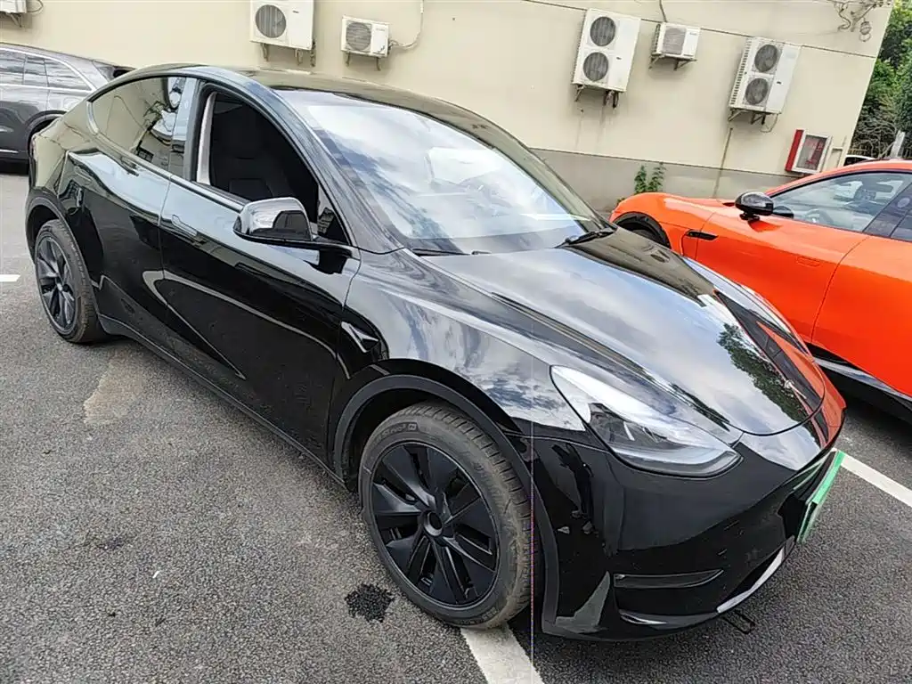 Tesla Model Y 2024 — фото 4