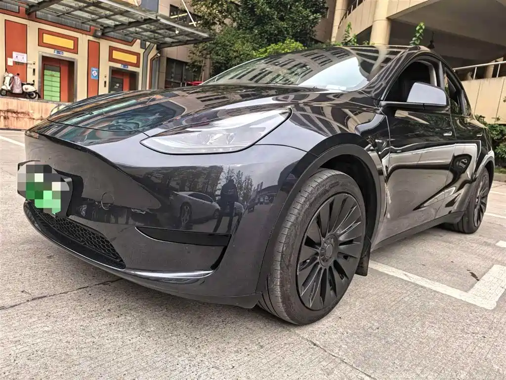 Tesla Model Y 2024 — фото 4