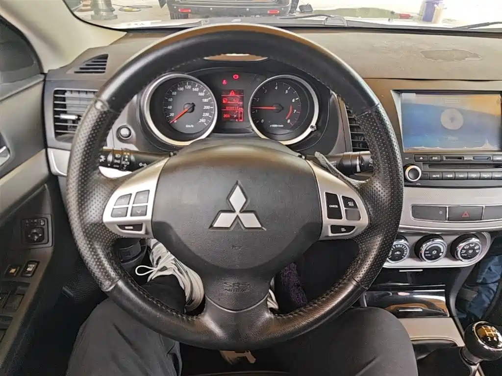 Mitsubishi Lancer EX 2015 — фото 11