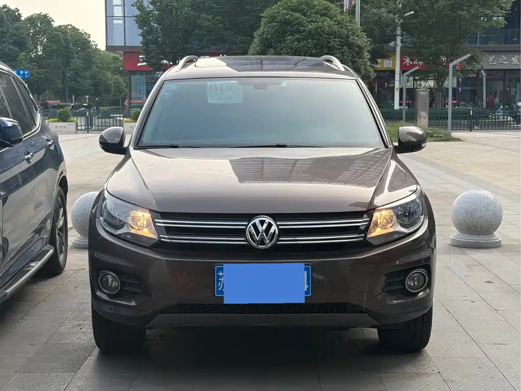 Volkswagen Tiguan 2013 — фото 2
