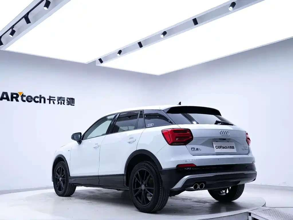 Audi Q2L 2021 — фото 10