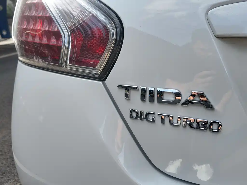 Nissan Tiida 2012 — фото 18