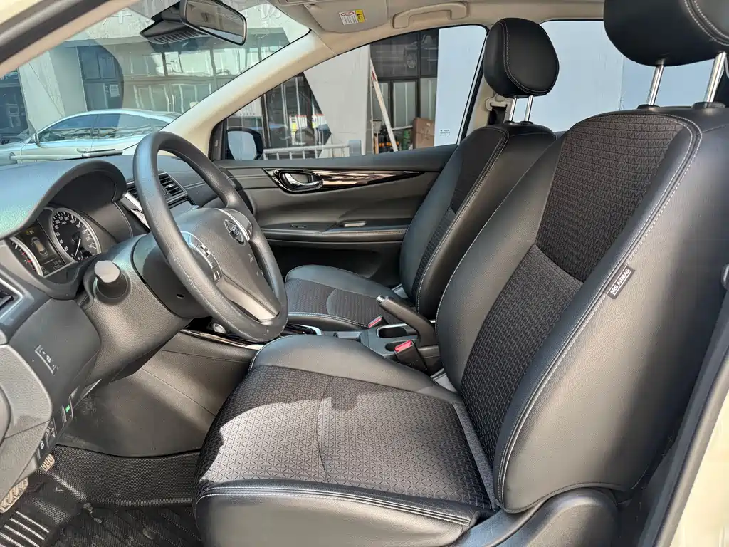Nissan Tiida 2018 — фото 10
