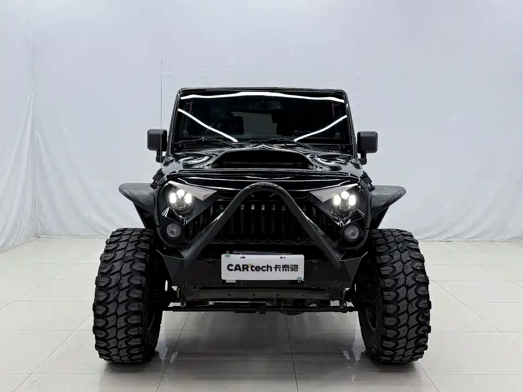 Jeep Wrangler 2014 — фото 2
