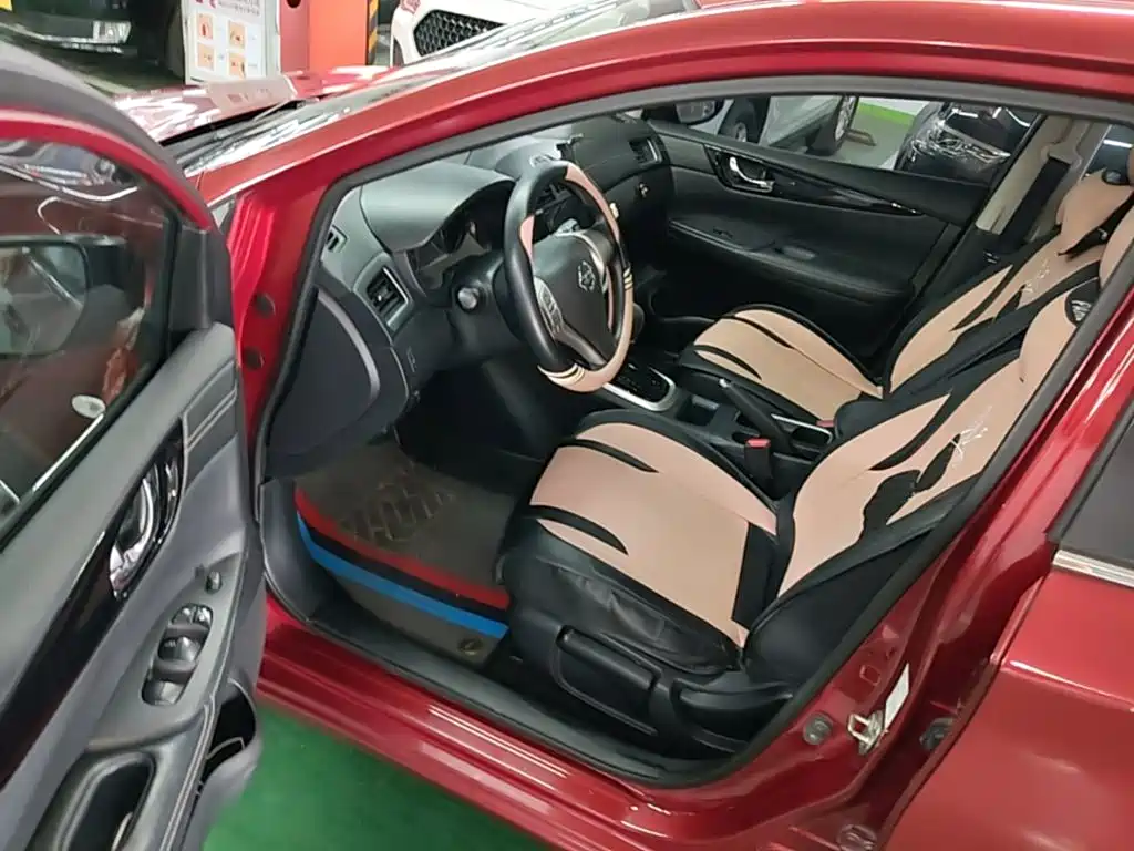 Nissan Tiida 2016 — фото 16