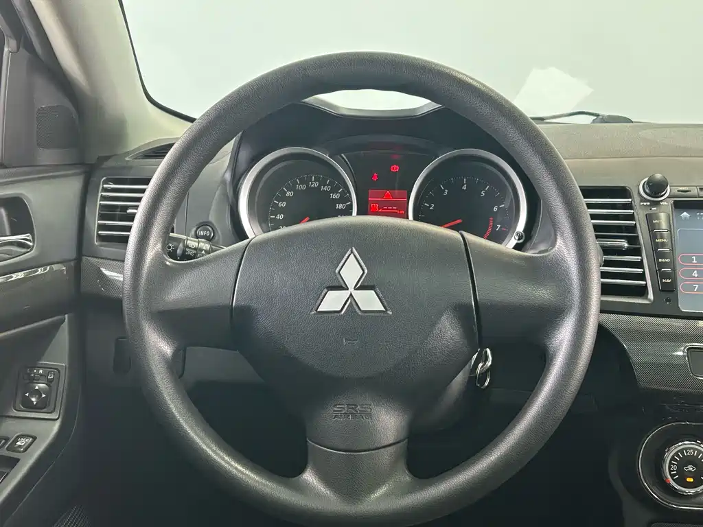 Mitsubishi Lancer EX 2012 — фото 15