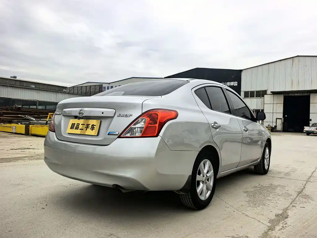 Nissan Sunny 2011 — фото 4