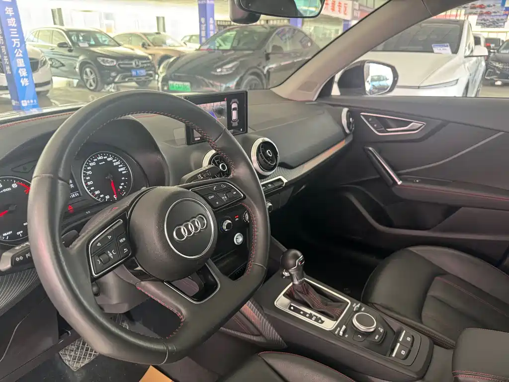 Audi Q2L 2022 — фото 10