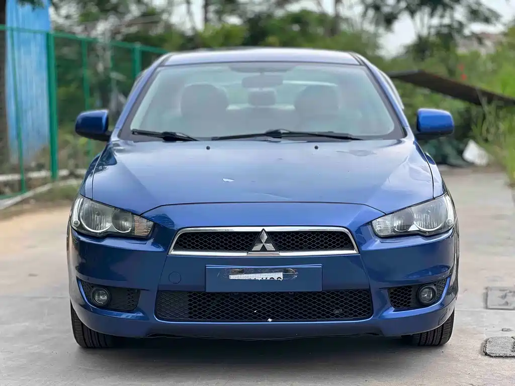 Mitsubishi Lancer EX 2010 — фото 2