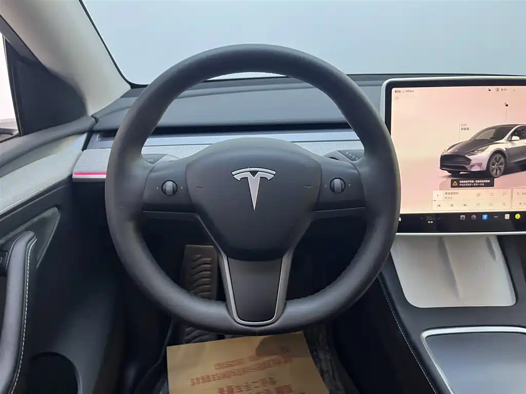 Tesla Model Y 2024 — фото 11