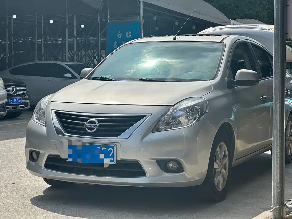 Nissan Sunny 2011 — фото 1