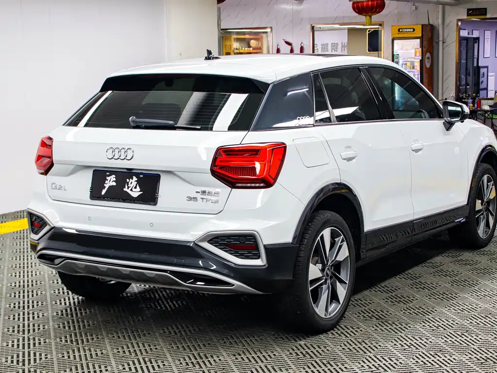 Audi Q2L 2022 — фото 24