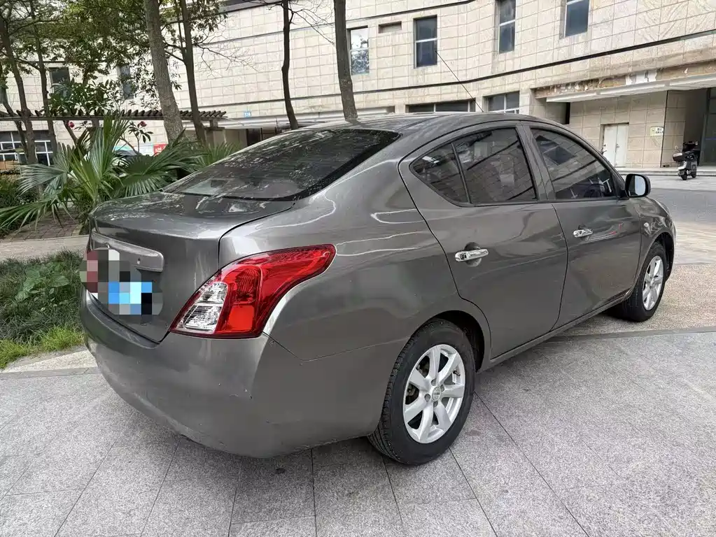 Nissan Sunny 2011 — фото 4