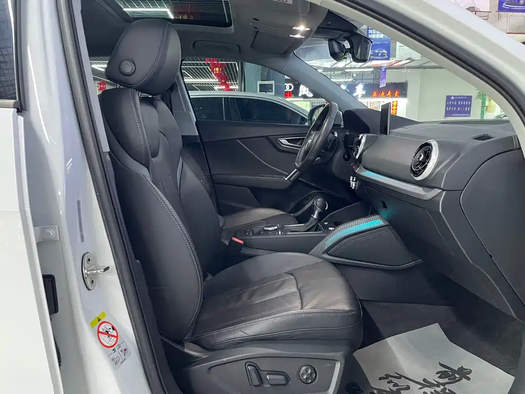 Audi Q2L 2022 — фото 11